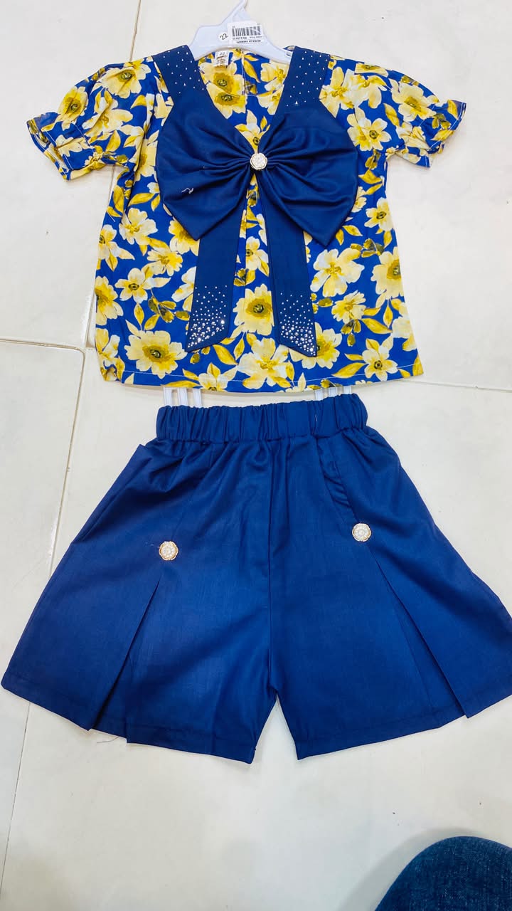 Eye-catching navy/royal blue blouse with a bright yellow floral print 1yr to 3yr